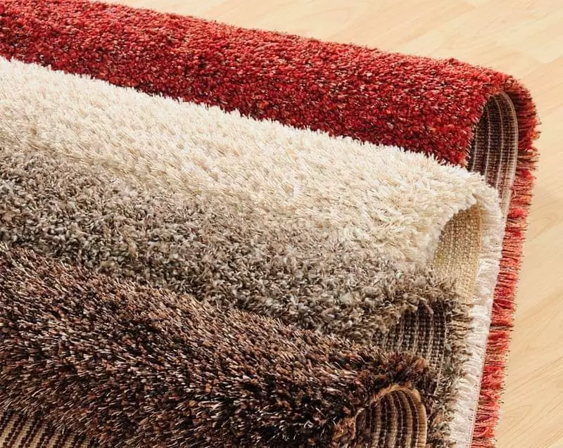 Якісний вовняний ковролін може наздоганяти килими за вартістю